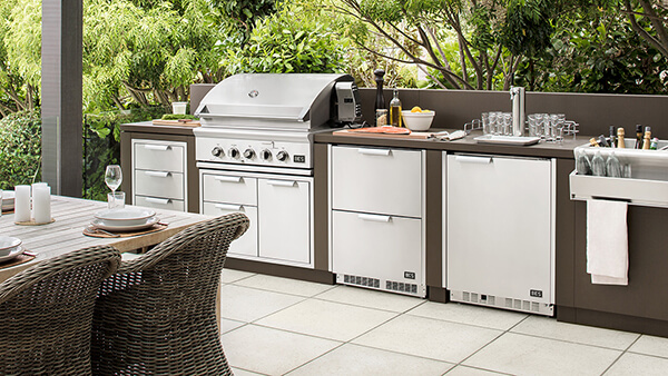 Lineup of DCS outdoor kitchen appliances range